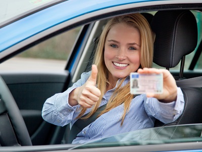 Woman showing license 